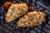 Video Clip Of Juicy Seasoned Chicken Breasts, Pollo Asado On A Hot Charcoal Grill