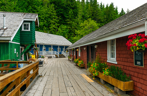 Colorful street with traditional Canadian architecture and historic buildings in Telegraph Cove, Vanvouver Island, British Columbia, Canada.