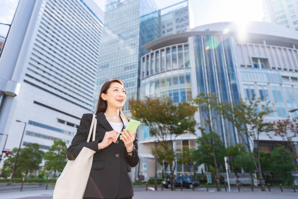 istock asian woman who see a smart phone 1221720658