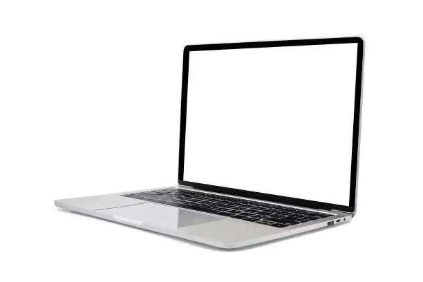 Photo of Side view of Open laptop computer. Modern thin edge slim design. Blank white screen display for mockup and gray metal aluminum material body isolated on white background with clipping path.