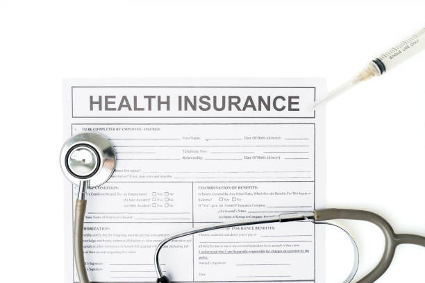 istock Top down view of health insurance document paper 1221721904