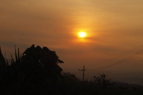 istock Sunset in my village 1221724656