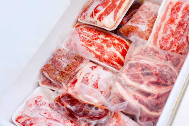 Flat layout of red meat package stacks in a box