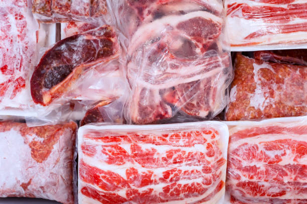 istock Top closeup of red meat package stacks in a box 1221725386