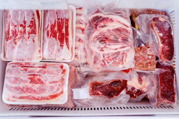 istock Top down view of red meat package piles in a box 1221725389