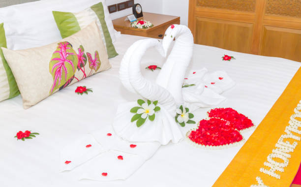 istock Bedroom design with swans from the towel decoration 1221727129
