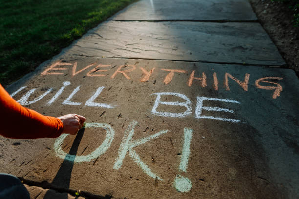 istock Everything Will Be Ok Message on the sidewalk during COVID-19 1221727772