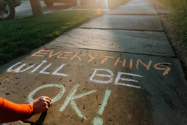 istock Everything Will Be Ok Message on the sidewalk during COVID-19 1221727787