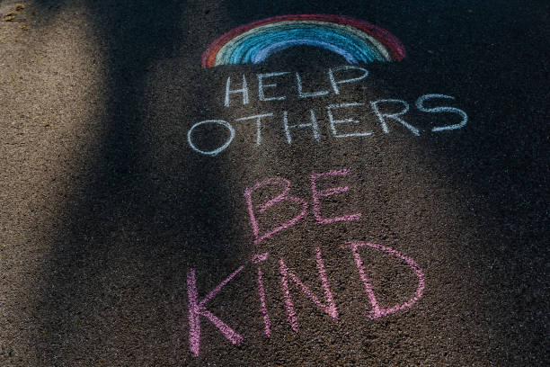 istock Help Others Message on the sidewalk during COVID-19 1221727807