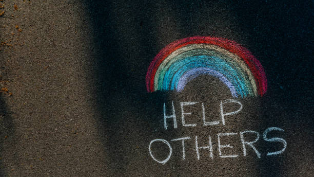 istock Help Others Message on the sidewalk during COVID-19 1221727825
