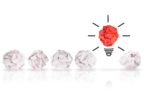 istock Idea Concepts with Light Bulb Crumpled Paper on White Background 1221727994
