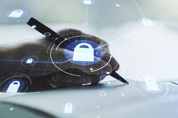 istock Creative lock illustration with microcircuit and man hand writing in diary on background, cyber security concept. Multiexposure 1221735060