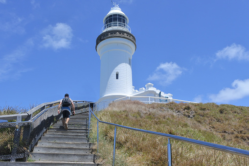 One tourist visiting at Byron Bay lighthouse lookout in New South Wales, Australia.