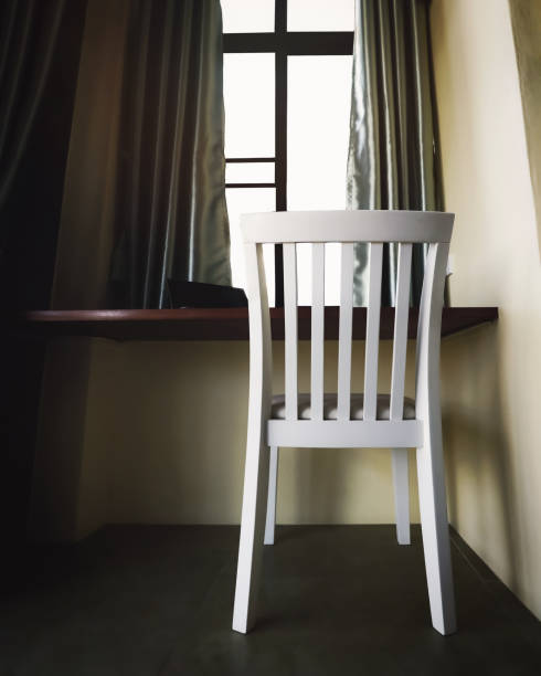 istock light through the window and chair 1221736898