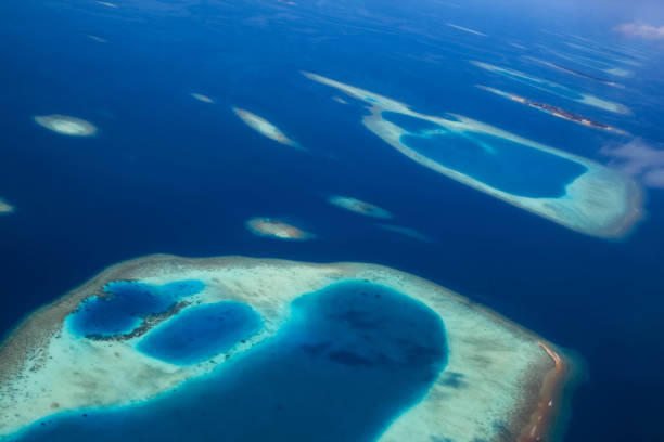 istock Maldives aerial view of several islands 1221737863