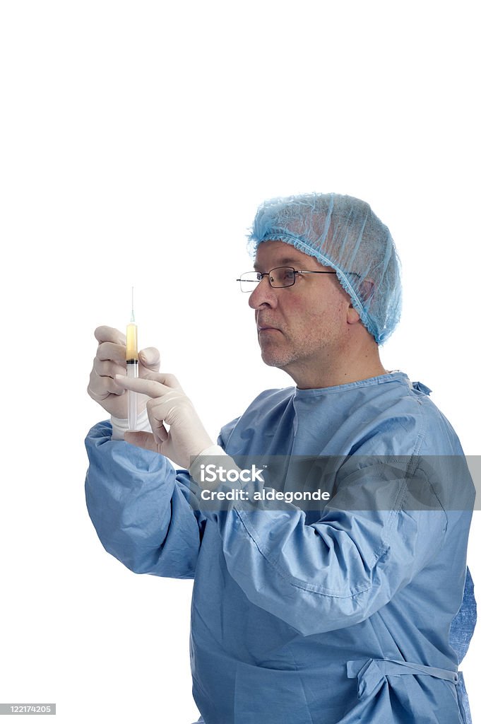 Médico com seringa e roupas de protecção - Royalty-free Adulto Foto de stock