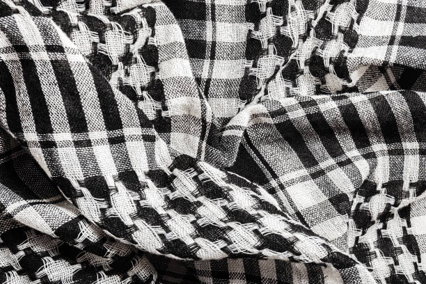 istock black and white arabic scarf background 1221745891