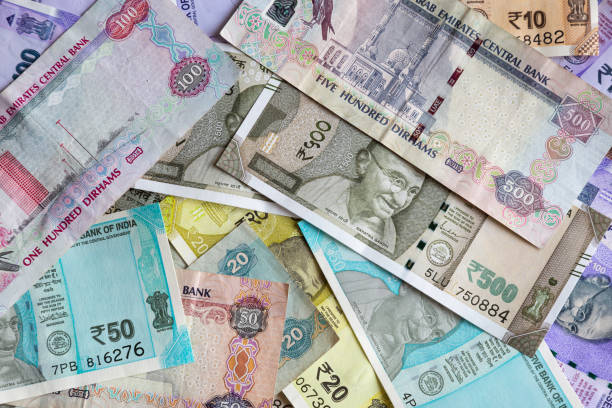 istock United Arab Emirates Dirham and Indian Rupee currency notes 1221746121