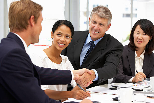 istock Business people shaking hands in meeting 122174645