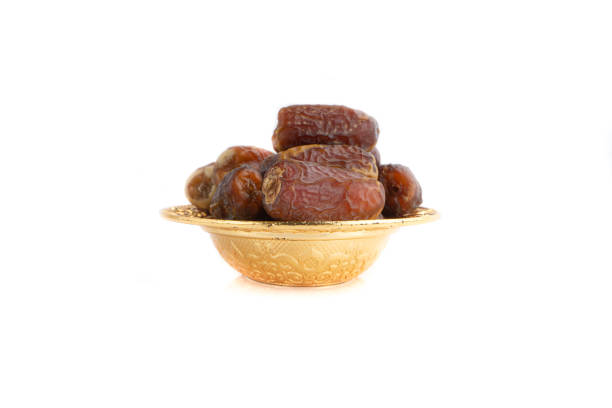 istock Date fruits or dry dates isolated on white background. 1221748246