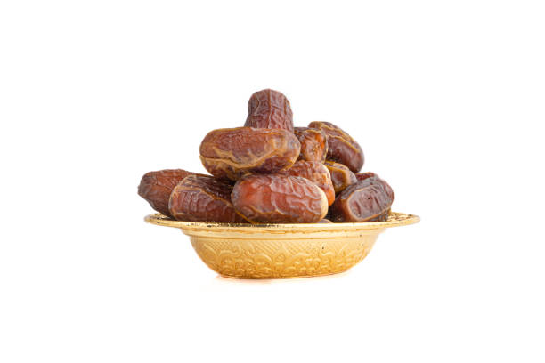 istock Date fruits or dry dates isolated on white background. 1221748305