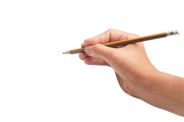 istock Child hand draws pencil. Isolated on white background. Blank sheet. Above view. Hand write on a paper with a pencil. 1221750864
