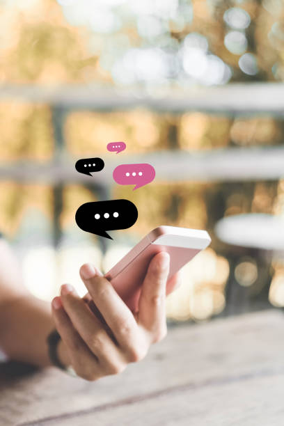 istock Woman hand using smart phone at coffee shop with email icon flying and line dot abstract. 1221753076