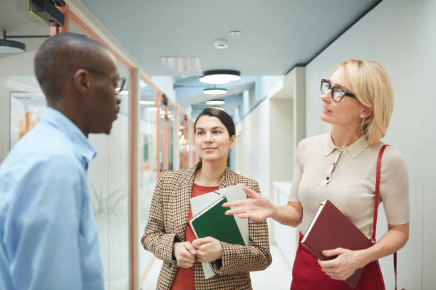 istock Business colleagues cooperating at office 1221754207