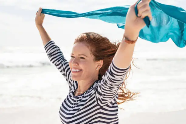 Photo of Carefree and freedom mature woman