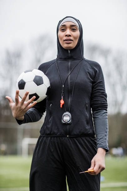 istock Beautiful Young Female Muslim Referee 1221758541
