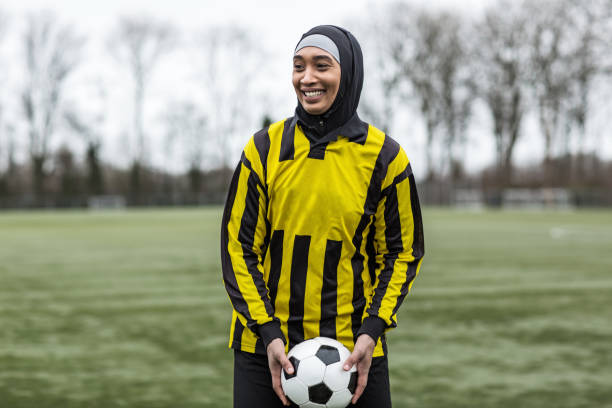 istock Beautiful Young Female Muslim Soccer Player 1221759207