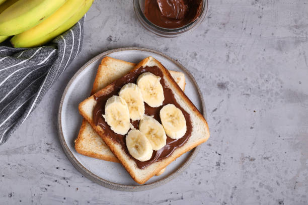 istock toast with chocolate paste and banana 1221759230