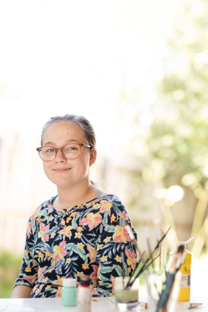 istock Young Girl Doing Art In Back Garden 1221761042