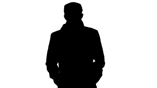Close up. Silhouette Gentleman with medical face mask walking. Professional shot in 4K resolution. 53. You can use it e.g. in your medical, commercial video, business, presentation, broadcast