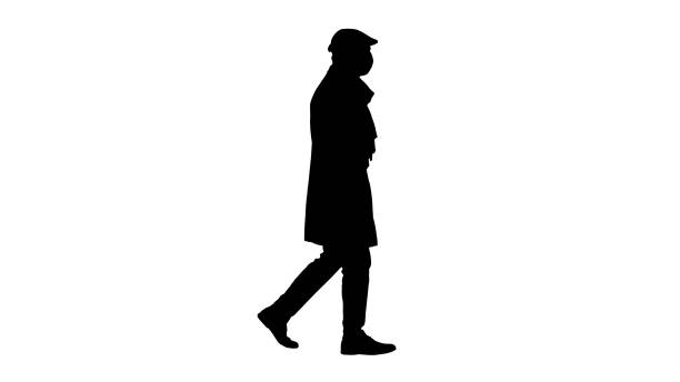 Wide shot. Side view. Silhouette Gentleman wearing a protective face mask walking. Professional shot in 4K resolution. 53. You can use it e.g. in your medical, commercial video, business, presentation, broadcast