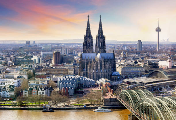 istock Cologne Cathedral and Hohenzollern Bridge at sunset - night 1221765687