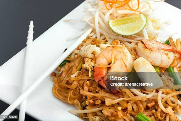 Seafood Pad With Thai Fried Rice Noodles Stock Photo - Download Image Now - Bean, Brussels Sprout, Bud