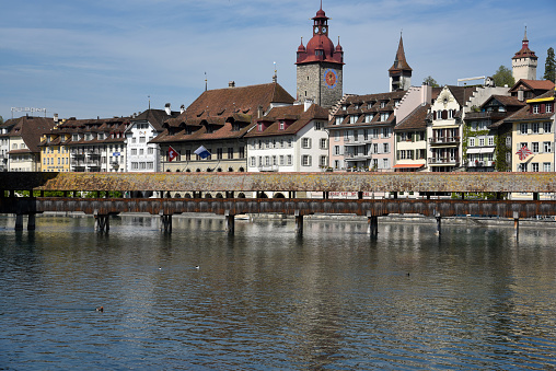 The beuatiful and well known Kapellbrücke of Lucerne in Switzerland, captured during a beatiful sunny day during springtime. The image was made during the COVID-19 pandemic.