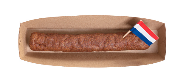 One frikadel, a Dutch fast food snack on a paper tray