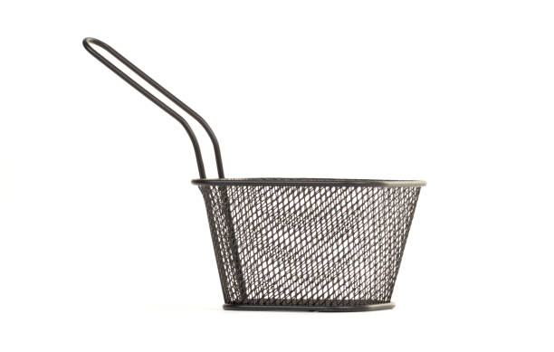 istock Small wire frying basket isolated on white background 1221768407