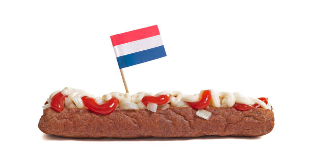 One frikadel with ketchup, mayonnaise on chopped onions, a Dutch fast food snack called 'frikadel speciaal', the Netherlands One frikadel with ketchup, mayonnaise on chopped onions, a Dutch fast food snack called 'frikadel speciaal', the Netherlands frikandel speciaal stock pictures, royalty-free photos & images