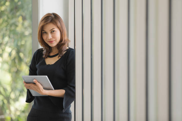 istock Lady in black dress 1221768561