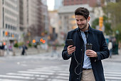 Man listening to music in the streets of New York