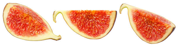 istock slice of fig collection. slice of fig isolated on white. Clipping Path 1221771415