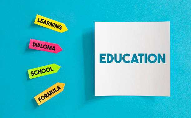 istock Colorful Sticky Notes Papers And White Paper with Education Message Over the Blue Paper. 1221772826