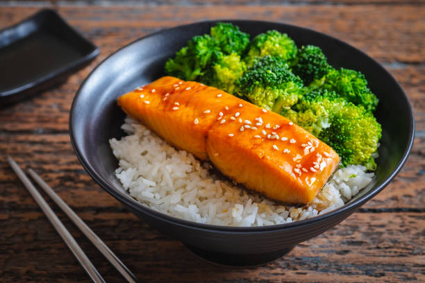 istock Salmon teriyaki with rice and vegetable in bowl 1221774894