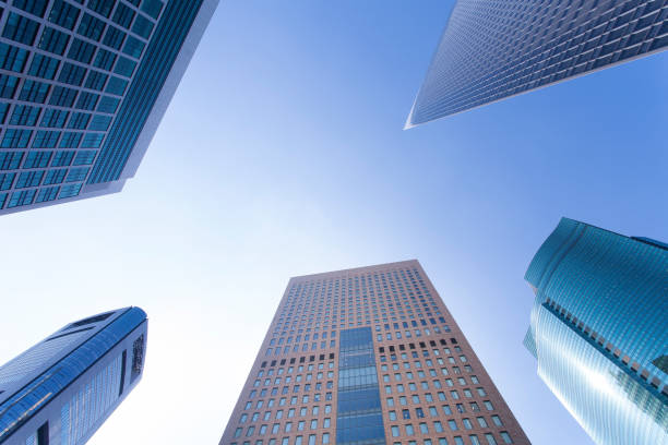 istock Looking up at skyscrapers sunny day 1221775038