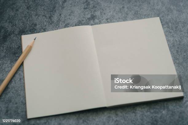 Sharp Pencil And Plain Notebook On Black Background With Copy Space Photo  Concept Of Design And