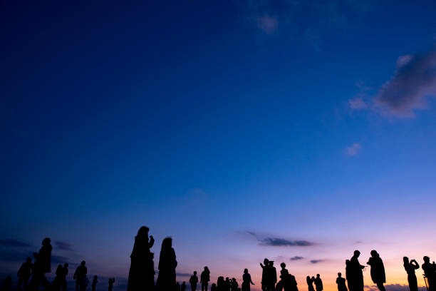 istock Silhouettes of people at evening 1221779521