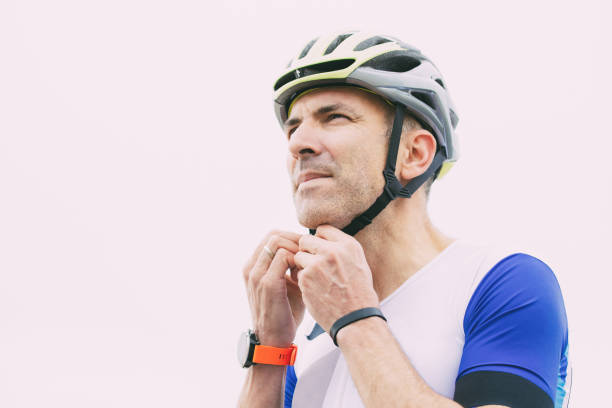 istock Male cyclist wearing helmet 1221781114